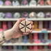 Smoked Vanilla cream segmented wax melt held in hand