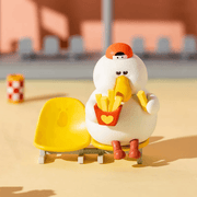 Sneaky Fatgoose relaxing on a yellow bench with a carton of chips