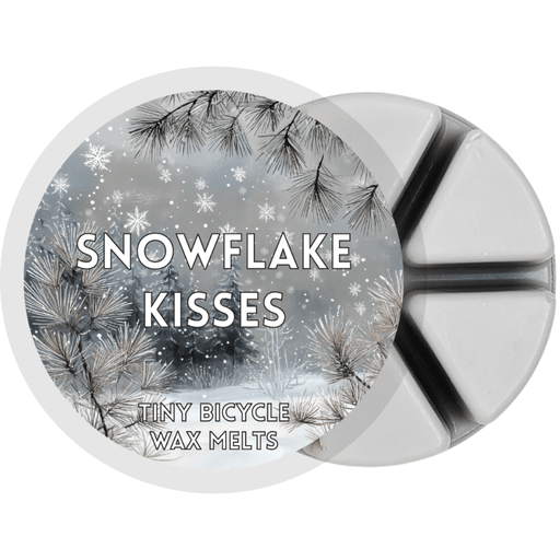 Snowflake Kisses grey segmented wax melt pot with illustrated snowy forest and falling snowflakes