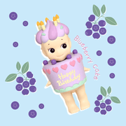 Sonny Angel Birthday Gift Blueberry Cake mini figure with purple frosting, pink hearts and blueberries