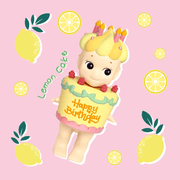 Sonny Angel Birthday Gift Lemon Cake mini figure with yellow icing, candles and raspberry decorations