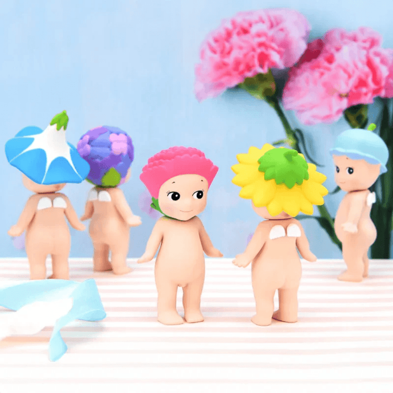 Sonny Angel Flower Series mini figures wearing colourful flower headgear