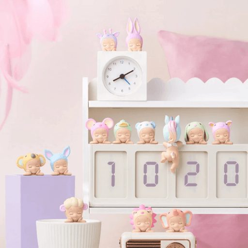 Pastel Sonny Angel Hippers Dreaming animal figures displayed on a clock
