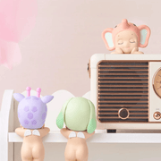 Giraffe, Lop Ear Rabbit and Elephant Sonny Angel Hippers displayed on a shelf