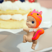 Sonny Angel Hippers Looking Back Hamster figure in bright orange and pink