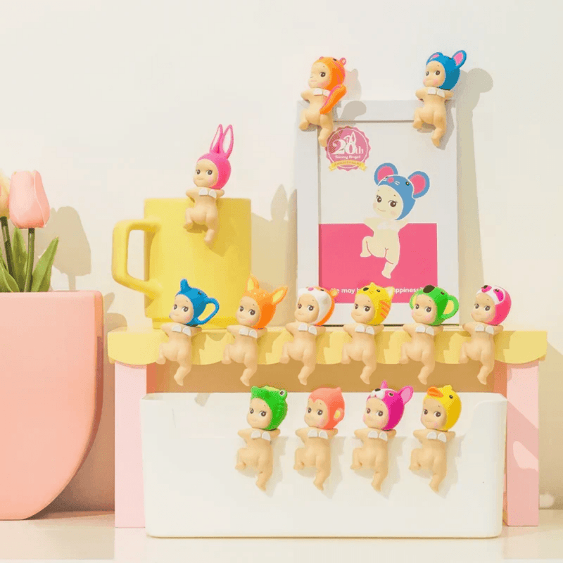 Sonny Angel Hippers Looking Back Series collection displayed on desk accessories