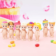 Sonny Angel Sweets Series collectable mini figures displayed together with colourful desserts