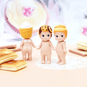 Three Sonny Angel Sweets Series mini figures wearing ice cream, cookie and pastry-inspired hats