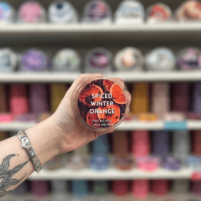 Spiced Winter Orange wax melt pot with orange and spice label