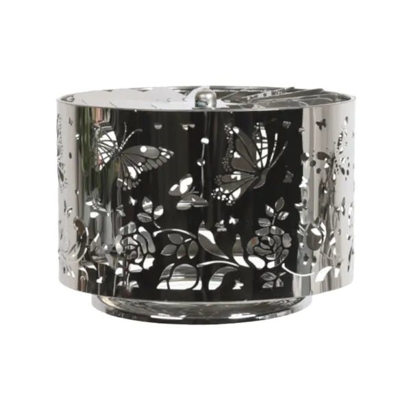 Silver carousel candle shade with butterfly and floral design, shown unlit with intricate cut-out detailing.

