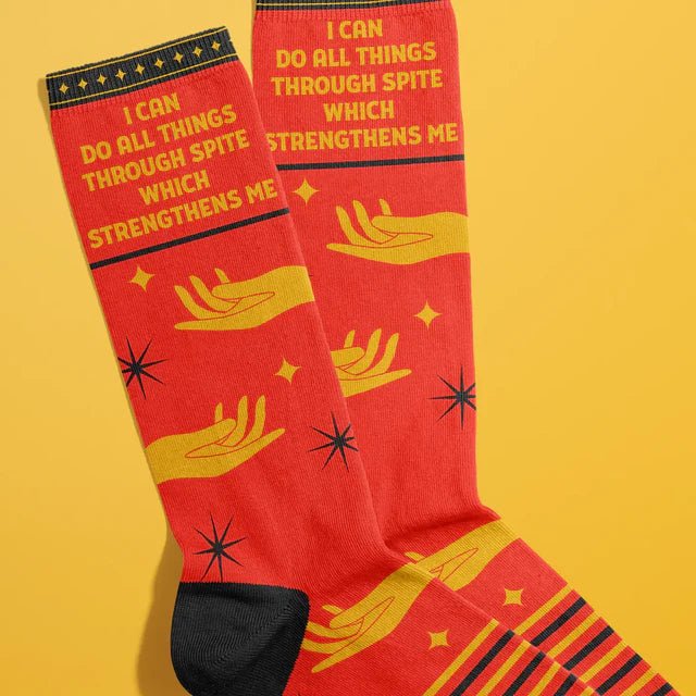 Fun Club red socks with yellow hand graphic and “I Can Do All Things Through Spite” quote – a bold and funny womens gift.

