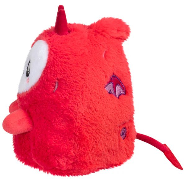Side profile of the Ghost Imp plush highlighting small horns, button detail and tail