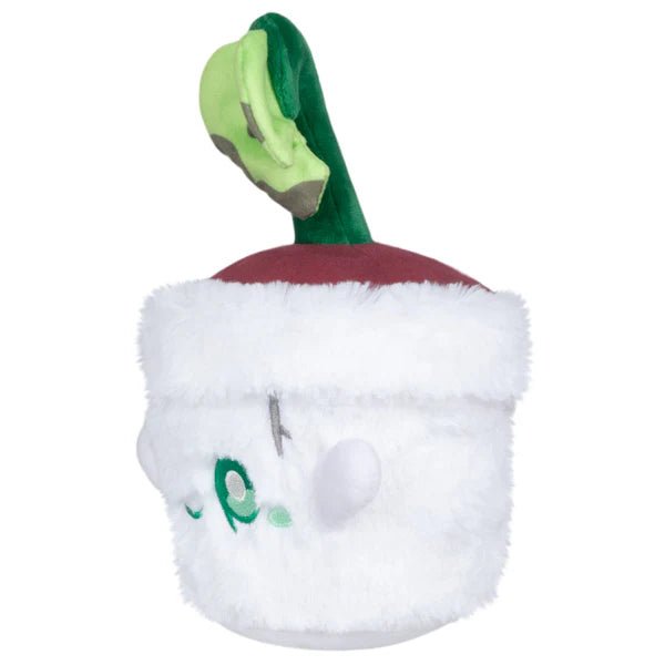 Side profile highlighting embroidered details and little arms on the Ghost Plant plush