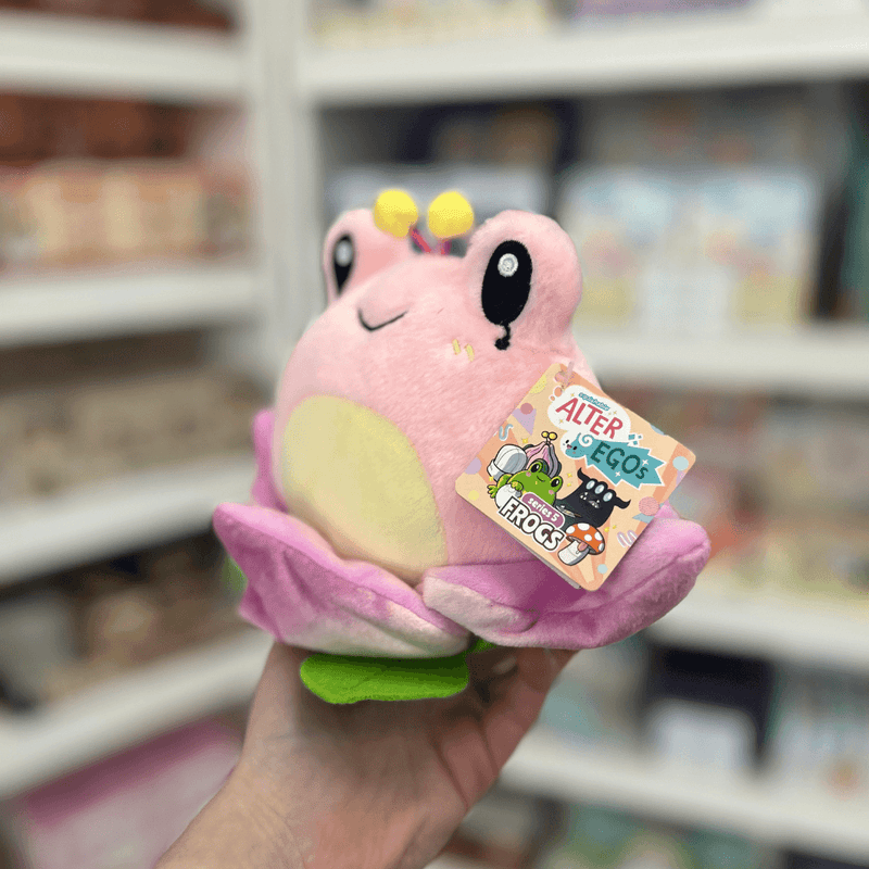 Squishable Alter Egos Lotus Frog plush toy held in hand with tag visible
