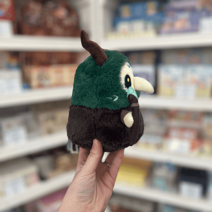 Squishable Alter Egos Series 17 Plague Doctor Forest Queen plush toy held in hand, side view