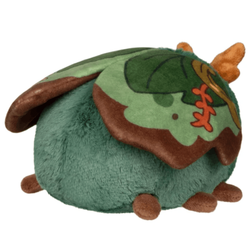 Side view of Squishable Bog Moth plush with green, brown and orange wing details