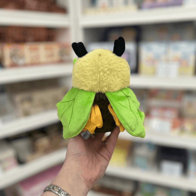 Squishable Alter Egos Series 8 Sage Moth plush toy held in hand, back view