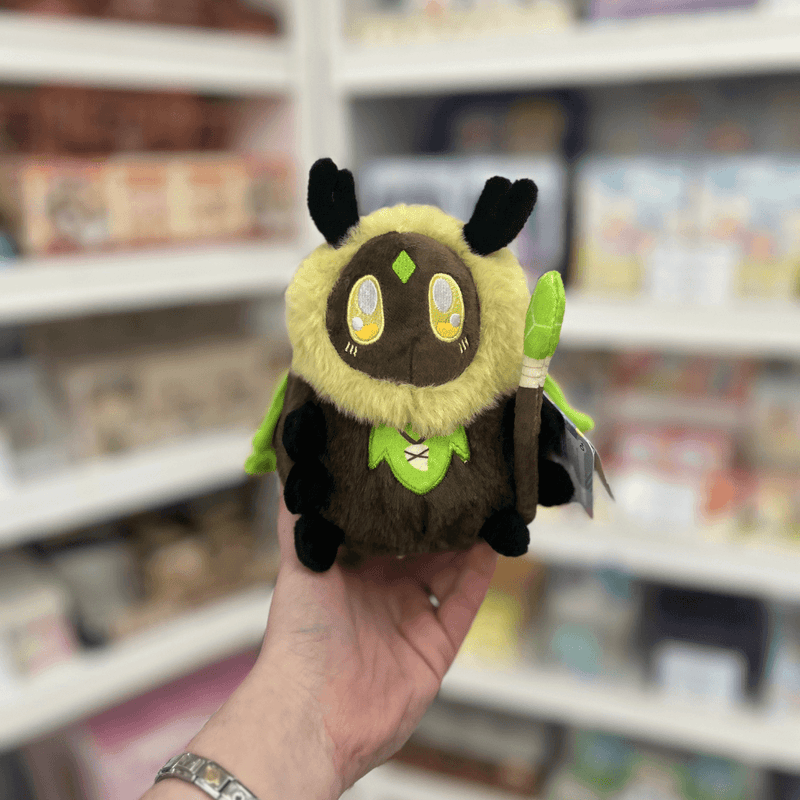 Squishable Alter Egos Series 8 Sage Moth plush toy held in hand, front view