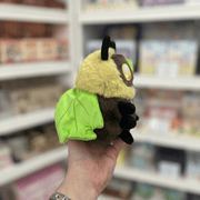 Squishable Alter Egos Series 8 Sage Moth plush toy held in hand with tag visible