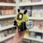 Squishable Alter Egos Series 8 Sage Moth plush toy held in hand with tag visible