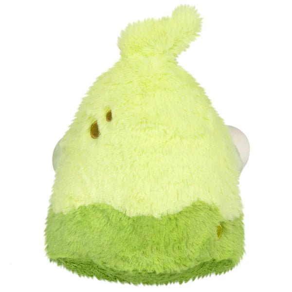 Side profile of the Slime Ghost plush highlighting skull accessory and embroidered bone detail