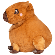 Side view of Squishable Capybara plush showing its rounded body and soft feet