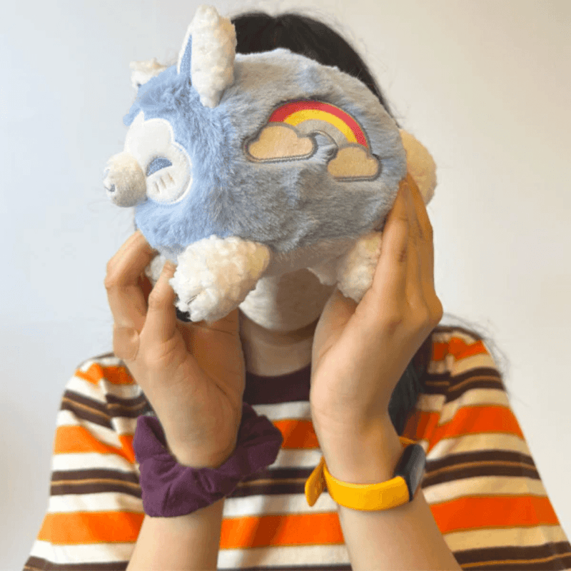 Person holding the Squishable Alter Egos Cloudy Kitsune plush toy