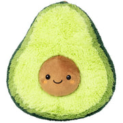 Front view of the Squishable Comfort Food Avocado plushie with smiling face and soft brown seed.