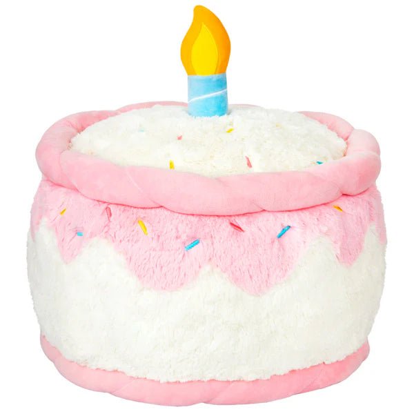 Back view of the Squishable Birthday Cake plushie showing pink piped icing and colourful sprinkles.