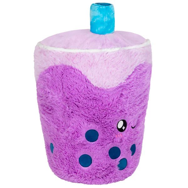 Side view of the Squishable Bubble Tea plushie with light purple foam and teal plush straw.