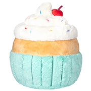 Back view of the Squishable Madame Cupcake plushie showing soft piping of white icing and plush cupcake wrapper.