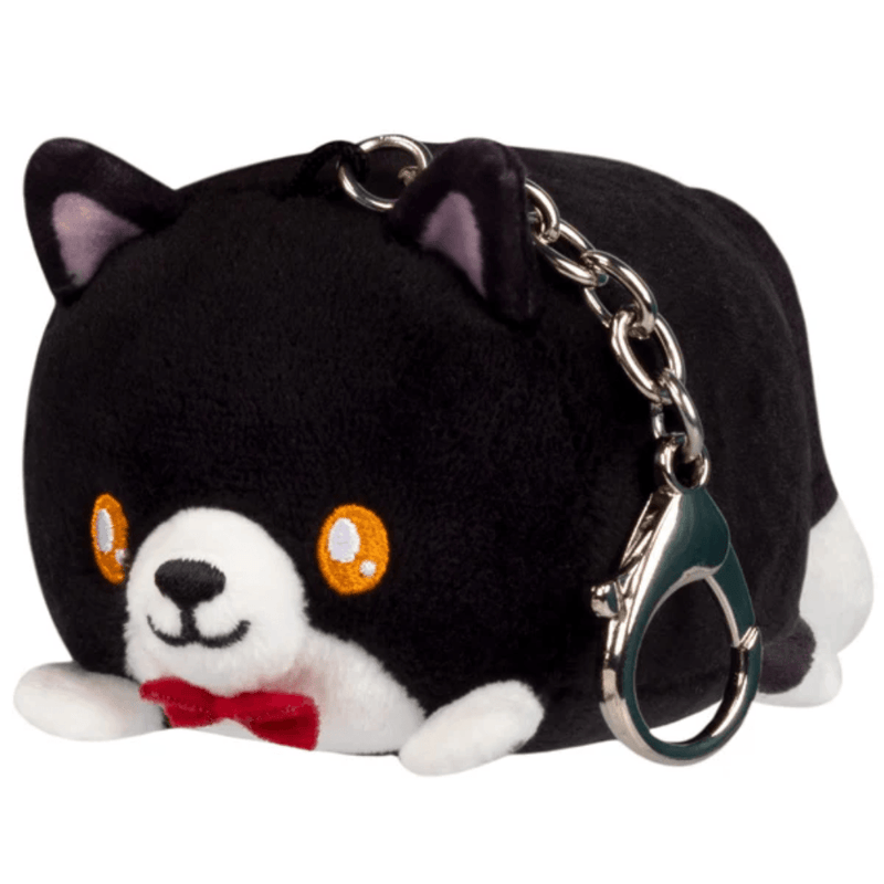 Tuxedo Squishable plush cat keychain with black and white fur and red bow tie