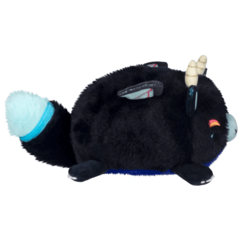 Side view of the Demon Kitsune plush showing its horns, ears and fluffy tail