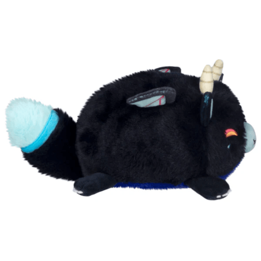 Side view of the Demon Kitsune plush showing its horns, ears and fluffy tail