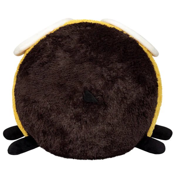 Back view of the Squishable Fuzzy Bumblebee plushie showing a fuzzy black surface with small stinger and wings.