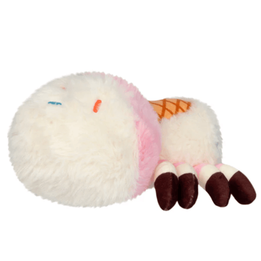 Side view of the Ice Cream Spider plush showing its fluffy body and striped legs