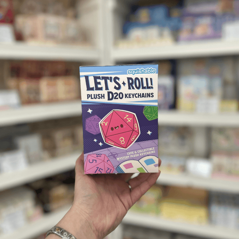 Squishable Let's Roll D20 Keychain Blind Box front packaging with cute collectible plush dice keychain artwork