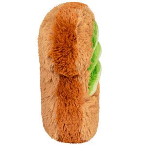 Side view of Squishable avocado toast plushie with raised plush avocado topping


