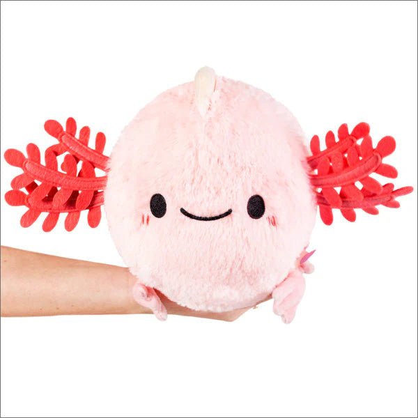 Front view of Mini Squishable Baby Axolotl plushie with pink gill frills and smiling face

