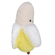 Side view of plush banana toy with white and yellow fluffy textures


