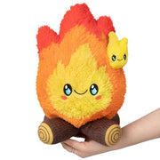 Front view of Mini Squishable Campfire plushie with smiling flame, logs, and mini flame buddy

