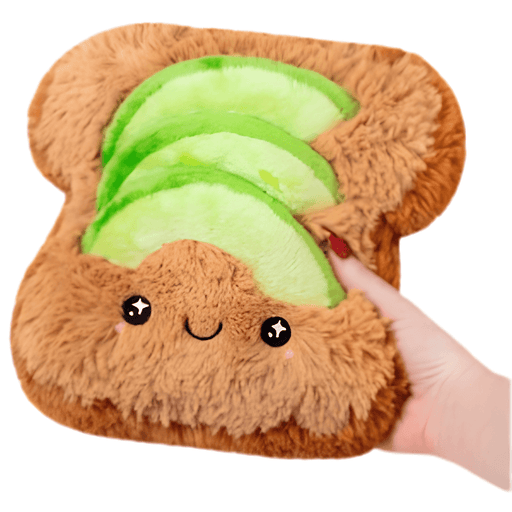 Mini Squishable Comfort Food Avocado Toast plush toy held in hand against a plain light background