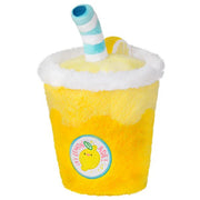 Back of the Mini Comfort Food Lemonade plushie showing a “Lemonade” badge and soft yellow texture.