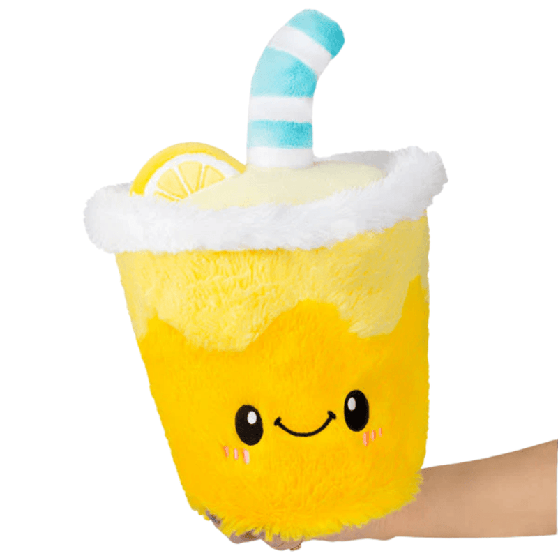 Mini Squishable Comfort Food Lemonade plush toy held in hand against a plain light background