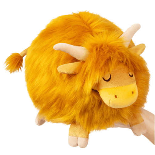 Golden Squishable Mini Highland Cow plush toy with shaggy fur and soft horns