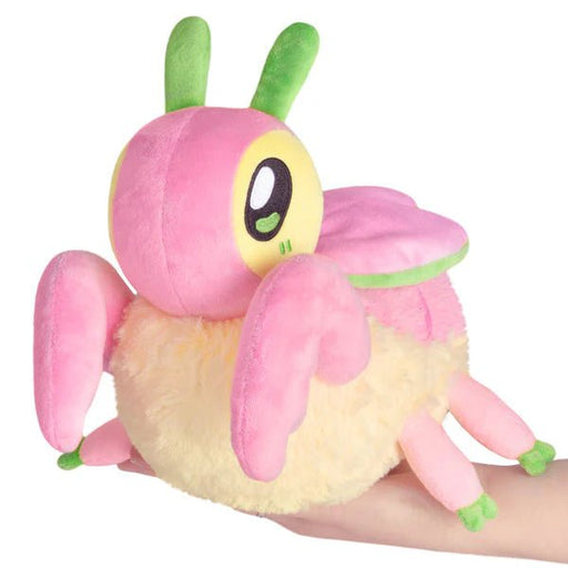 Front view of Mini Squishable Orchid Mantis plushie with pink wings and green antennae

