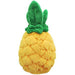 Back view of yellow pineapple plushie showing textured plush surface

