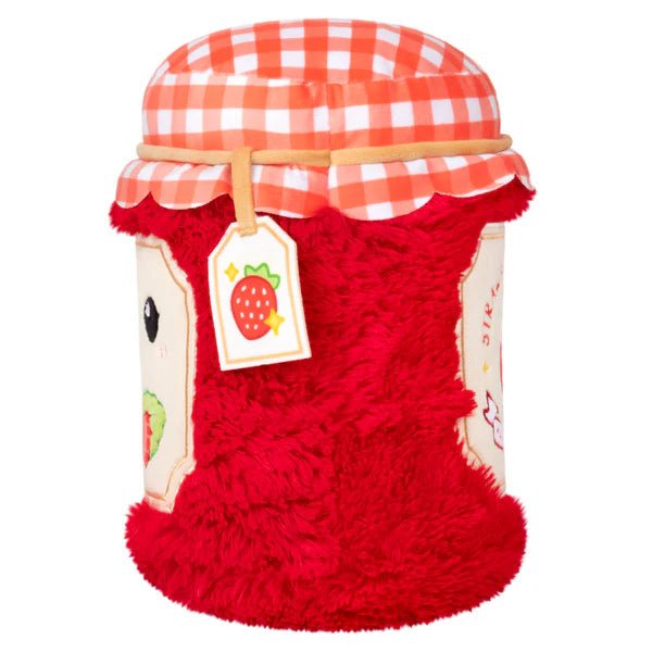 Side view of plush strawberry jam jar with stitched tag and soft checkered lid

