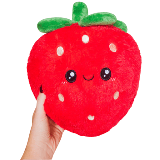 Squishable Mini Comfort Food Strawberry plush toy front view with smile and green leaves