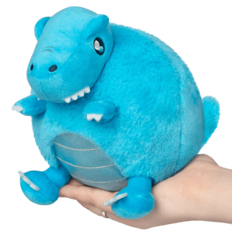Front view of Squishable Party Snacker Blue T-Rex plush toy with round belly